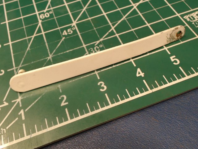 0411977-1 Cessna - Arm - Cabin Door Window