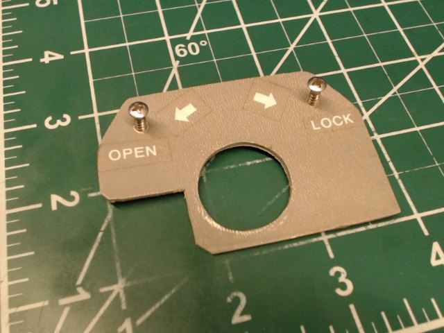 0705042-5 Cessna - Escutcheon - Cabin Door Handle