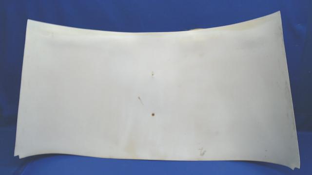 130184-015 Mooney - HEADLINER - BAGGAGE (Cracked at center screw hole)